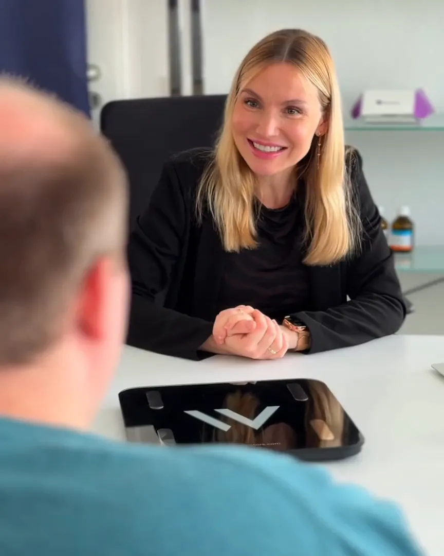Weight Doctors® adviser laughing during a consultation